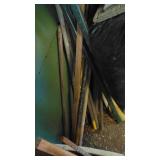 Container and Corner of Garden Stakes