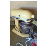 Yellow KitchenAid Mixer with Attachments and Book