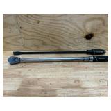 Husky: torque wrench and pry bar