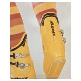 Vintage Kastinger Yellow Ski Boots with Striped Socks Poster