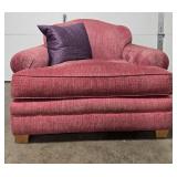 Plum Colored Oversized Plush Armchair with Decorative Pillow