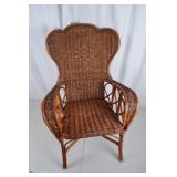 Wicker Armchair with Embroidered Floral Cushions
