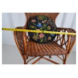Wicker Armchair with Embroidered Floral Cushions