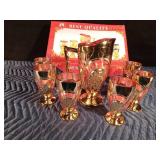 Gold and rose color pitcher with 6 glasses in original box