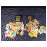 2 Pokémon tins with 50 Pokémon trading cards in each