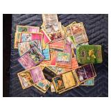 2 Pokémon tins with 50 Pokémon trading cards in each