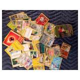 2 Pokémon tins with 50 Pokémon trading cards in each