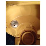 1973 Coleman green lantern with yellow case, key and funnel
