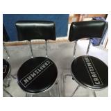 4 upholstered Craftsman metal stools