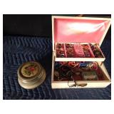 Jewelry box full of jewelry and vintage musical trinket box