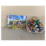 Container of Legos with Lego Book