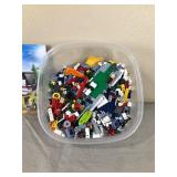 Container of Legos with Lego Book