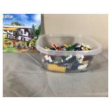 Container of Legos with Lego Book