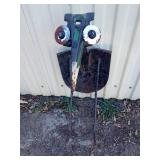 Metal bird lawn ornament made out of a shovel