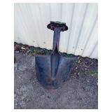 Metal bird lawn ornament made out of a shovel