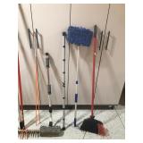 Shop broom, metal beach rake, extension poles, broom and more
