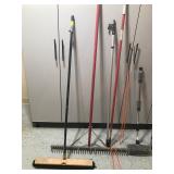 Shop broom, metal beach rake, extension poles, broom and more