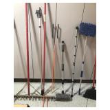 Shop broom, metal beach rake, extension poles, broom and more