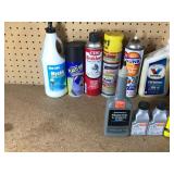 Lot of oil, lubricants, grease, engine cleaner, and more