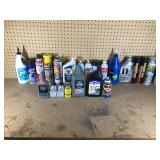 Lot of oil, lubricants, grease, engine cleaner, and more