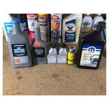 Lot of oil, lubricants, grease, engine cleaner, and more
