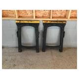 2 fold-up plastic sawhorses