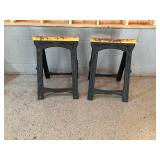 2 fold-up plastic sawhorses