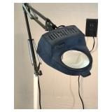 floor lamp with magnifying glass on wheels