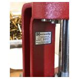 Table with Hornaday lock n load auto progressive reloading press attached with reloading equipment and more- can be shipped without table