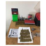 Table with Hornaday lock n load auto progressive reloading press attached with reloading equipment and more- can be shipped without table