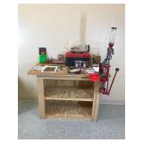 Table with Hornaday lock n load auto progressive reloading press attached with reloading equipment and more- can be shipped without table