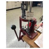 Table with Hornaday lock n load auto progressive reloading press attached with reloading equipment and more- can be shipped without table