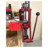 Table with Hornaday lock n load auto progressive reloading press attached with reloading equipment and more- can be shipped without table