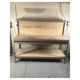 Metal framed work bench with 2 drawers, shelf and peg board on the back