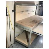 Metal framed work bench with 2 drawers, shelf and peg board on the back