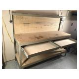 Metal framed work bench with 2 drawers, shelf and peg board on the back