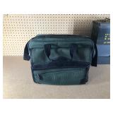 Metal ammo can, small travel bag, shooter
