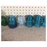 2 wood bowling pins, old casters, vintage bottles, glass insulators