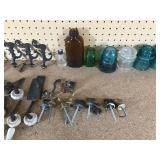 2 wood bowling pins, old casters, vintage bottles, glass insulators