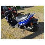 Yamaha Blue Scooter with Rear Rack