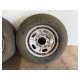 Set of 2 Used Grabber AW Tires with Rims