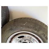Set of 2 Used Grabber AW Tires with Rims