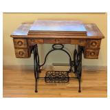 ML - Vintage Brunswick Treadle Sewing Machine with Ornate Oak Cabinet