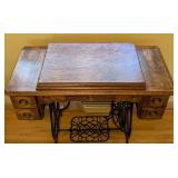 ML - Vintage Brunswick Treadle Sewing Machine with Ornate Oak Cabinet