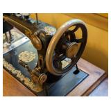 ML - Vintage Brunswick Treadle Sewing Machine with Ornate Oak Cabinet