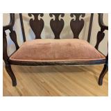ML - Antique Wood Settee with Pink Upholstered Seat and Carved Lion Armrests