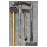 Set of 4 Used Hand Tools Including Sledgehammer, Pickaxe, Axe, and Mallet