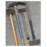 Set of 4 Used Hand Tools Including Sledgehammer, Pickaxe, Axe, and Mallet