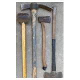 Set of 4 Used Hand Tools Including Sledgehammer, Pickaxe, Axe, and Mallet