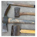 Set of 4 Used Hand Tools Including Sledgehammer, Pickaxe, Axe, and Mallet